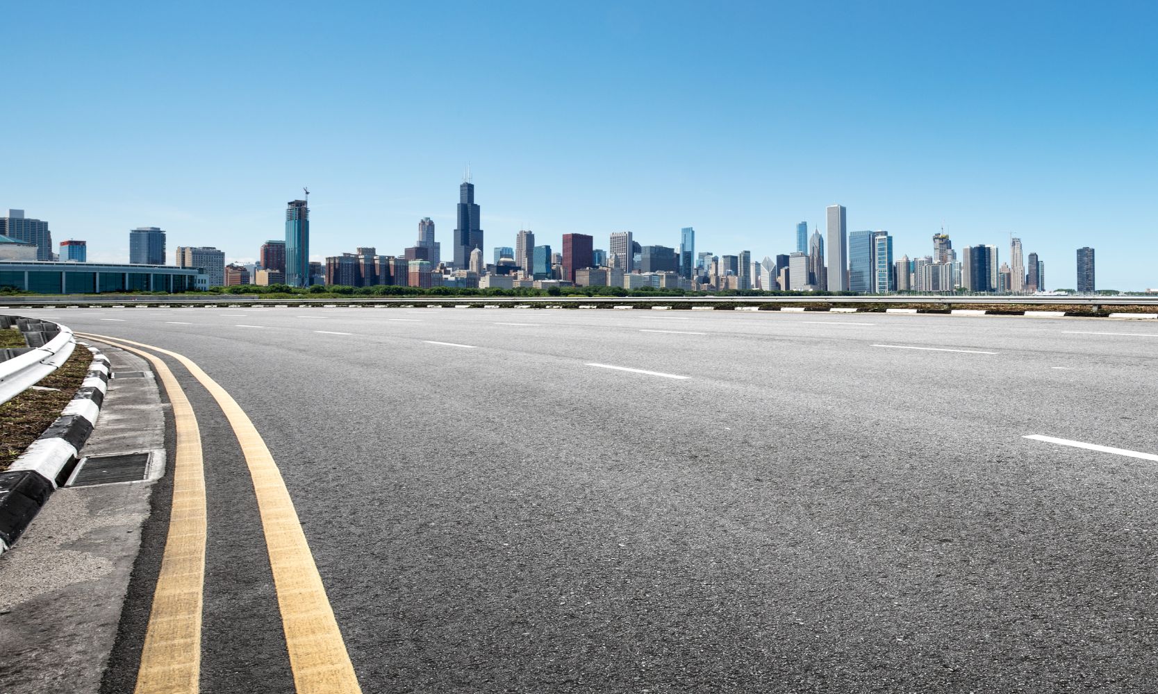Image of Chicago skyline in the distant with the major highway in front of it