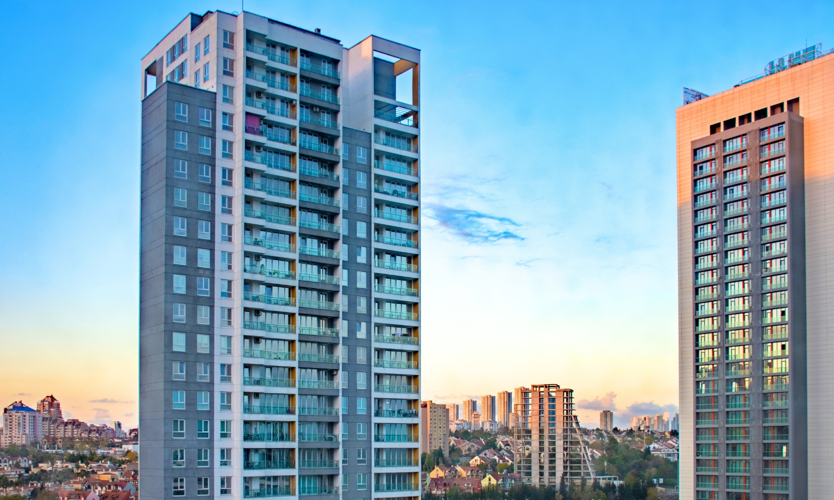 A photo of high-rise apartment and condo buildings in a city