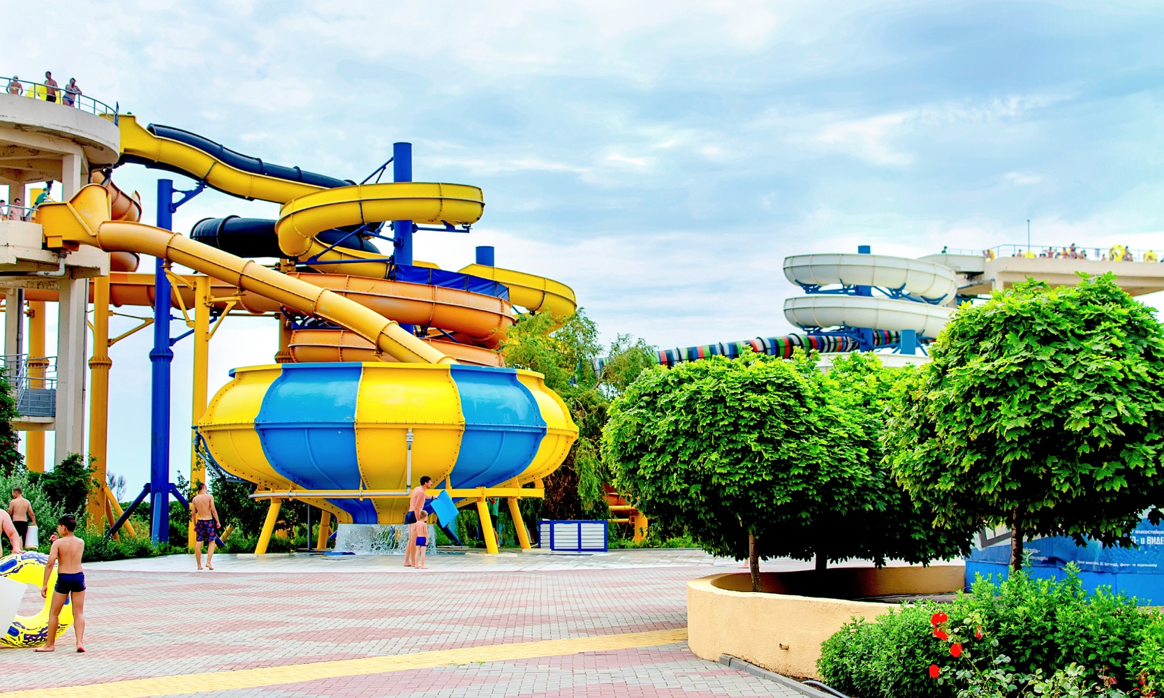 An image of people at an outdoor waterpark