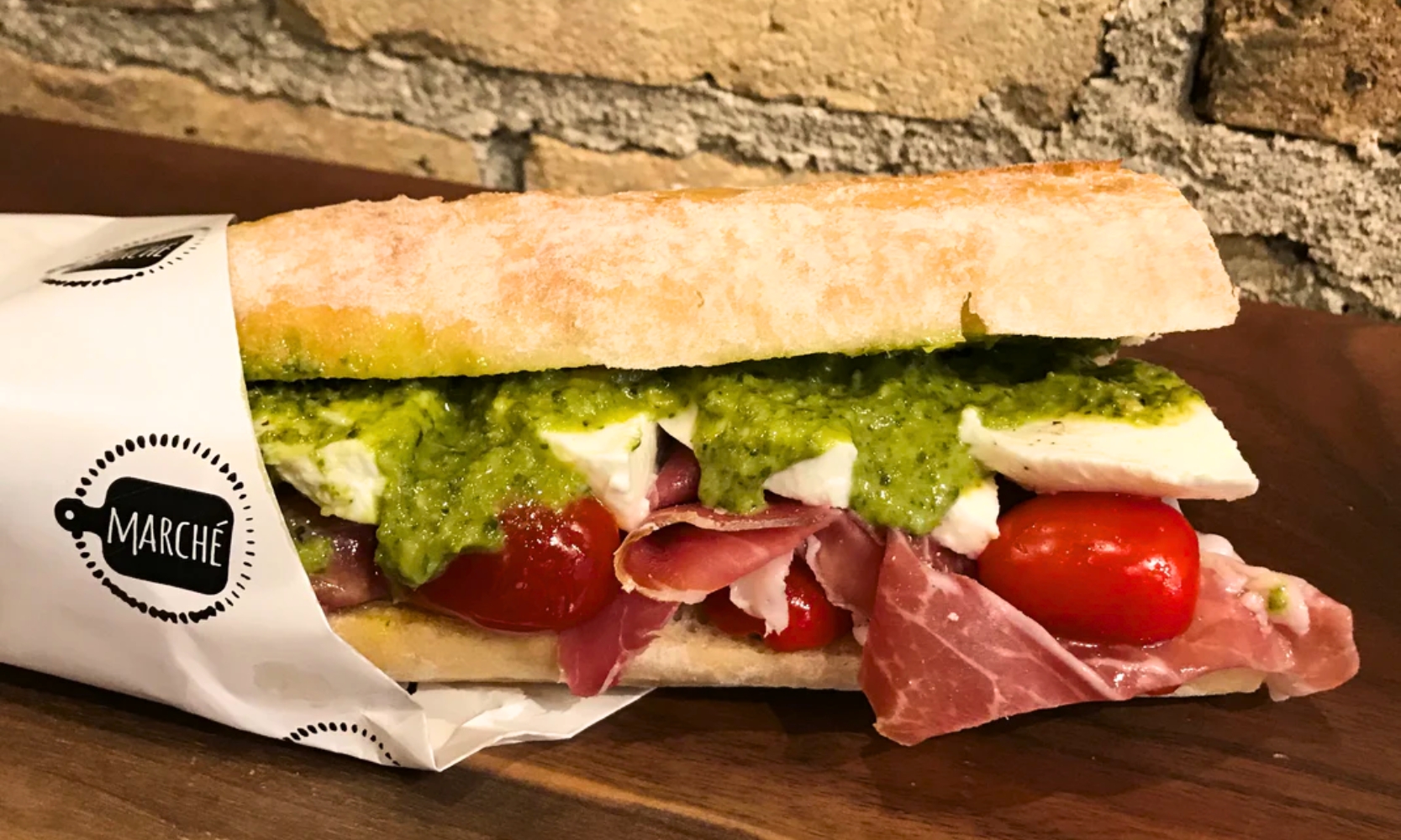 Closeup image of a prosciutto pesto sandwich at Marche in Glen Ellyn, IL