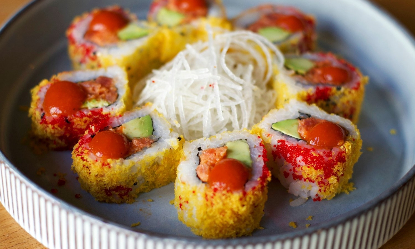 Closeup image of a sushi roll entree at Tanuki Sushi & Grill in Lakeview, Chicago