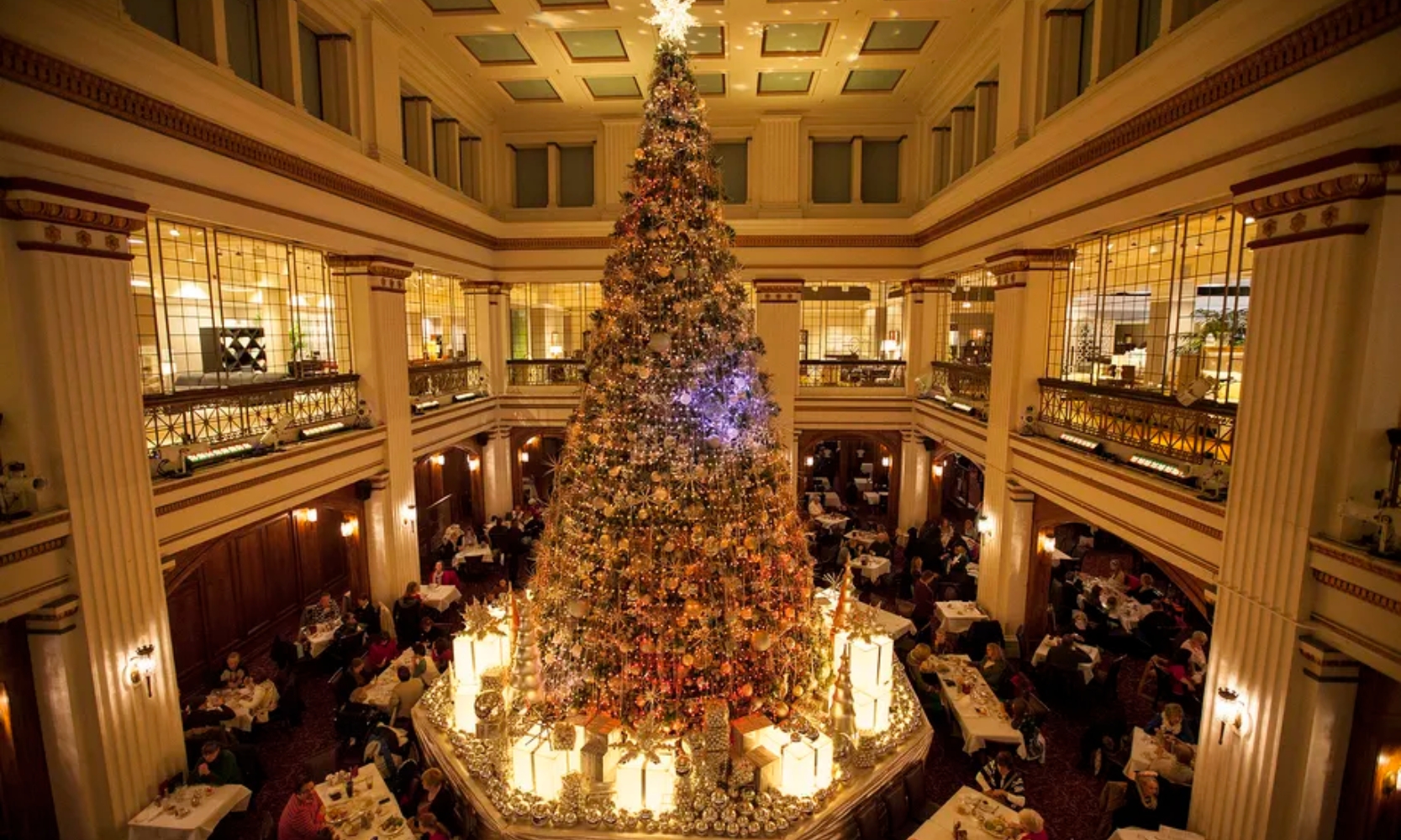 Image of the Macy's Walnut Room Christmas tree and dining area