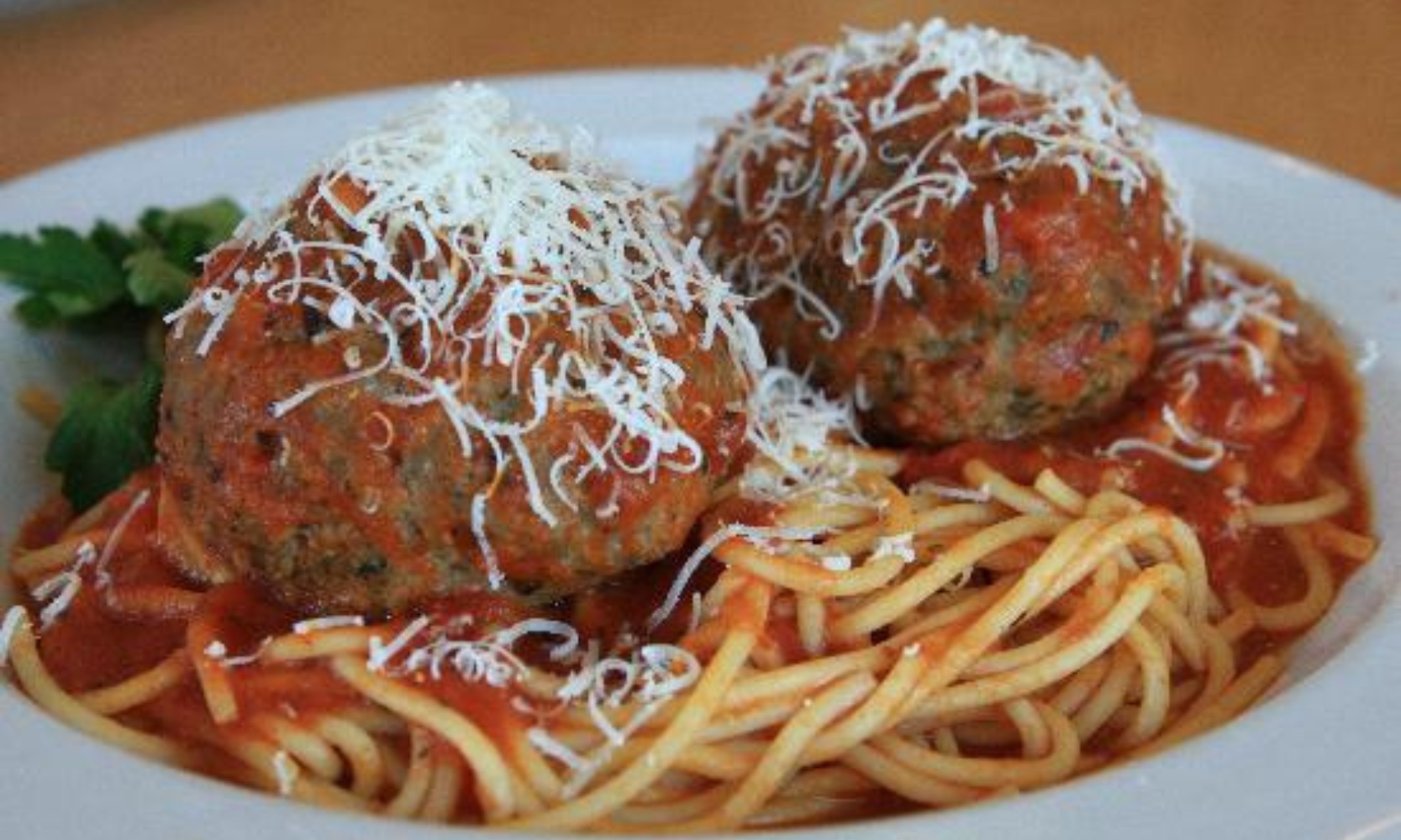 Closeup image of the spaghetti and meatball entree at Riganato Old World Grille in Geneva, IL