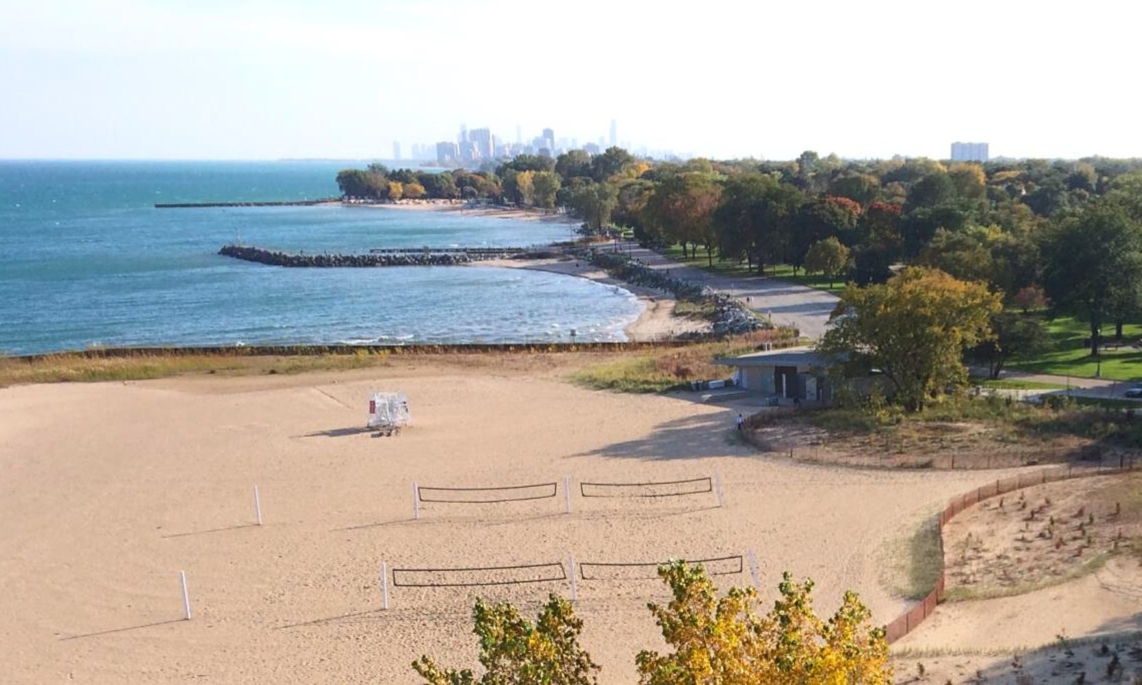 Aerial view image of Lee Street Beach in Evanston, IL with the Chicago skyline in the background