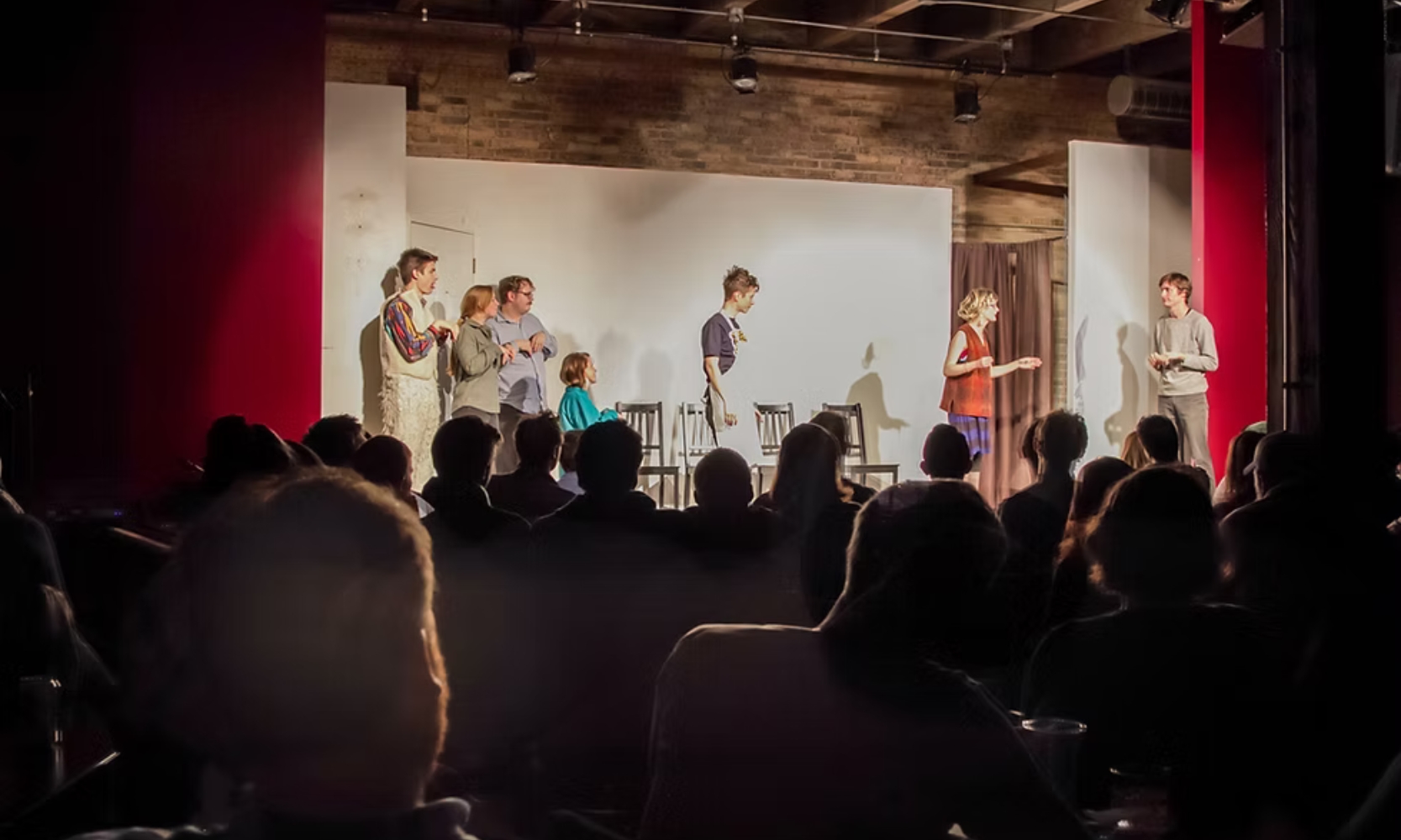 Interior image of an improv group comedy show at the Annoyance Theater in Chicago