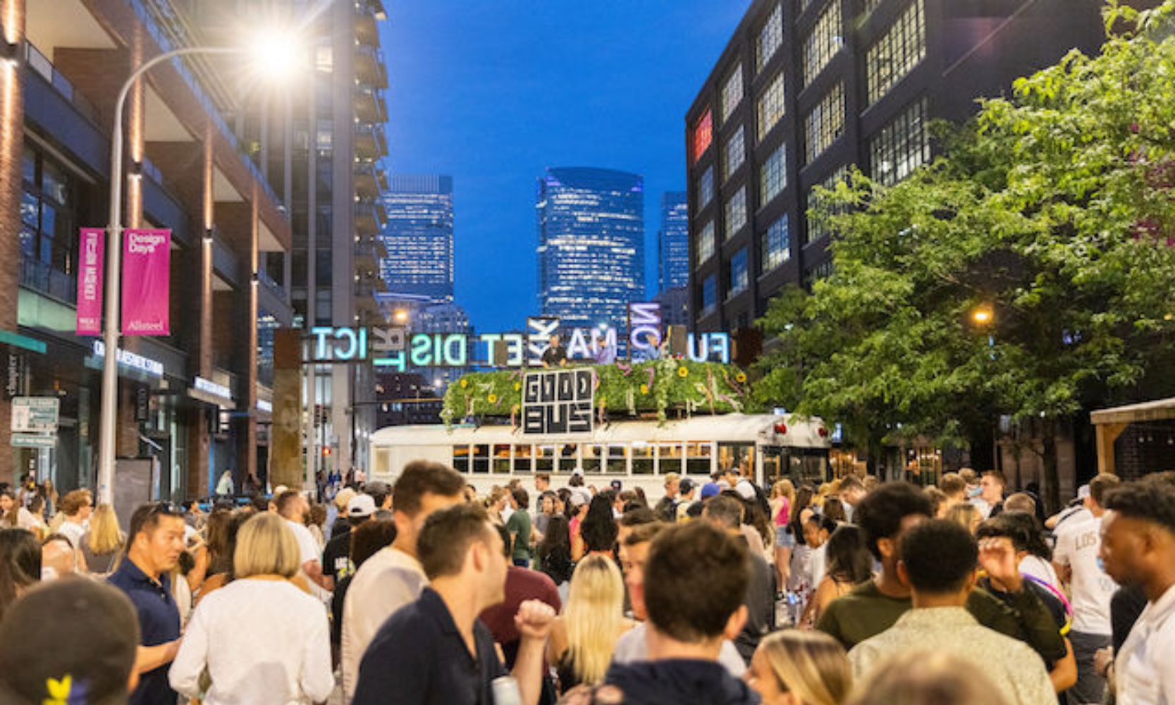 Street view image of the Fulton on Fridays event with the Chicago skyline in the background at Fulton Market District