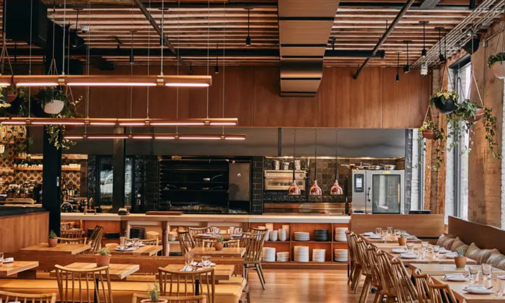 Interior image of Rose Mary restaurant with wooden modern furniture in Fulton Market District Chicago