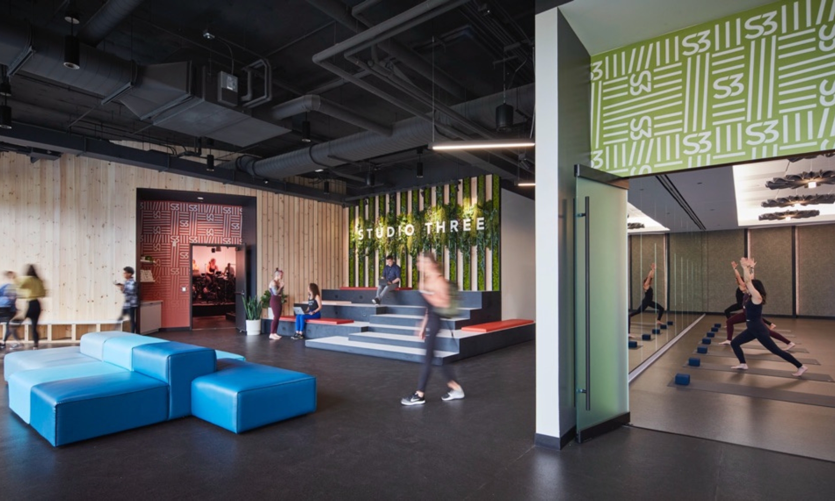 Interior image of Studio Three's Fulton Market District location with people working out