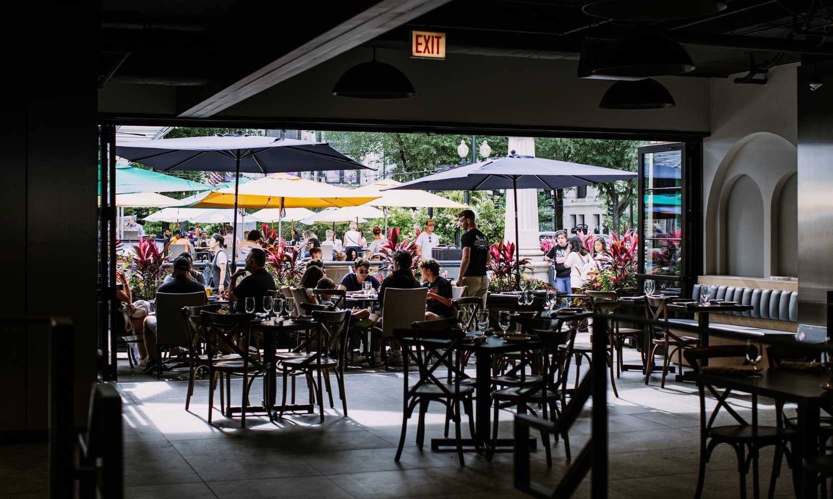 Interior image of the Millennium Hall Restaurant at Millennium Park with people eating al fresco