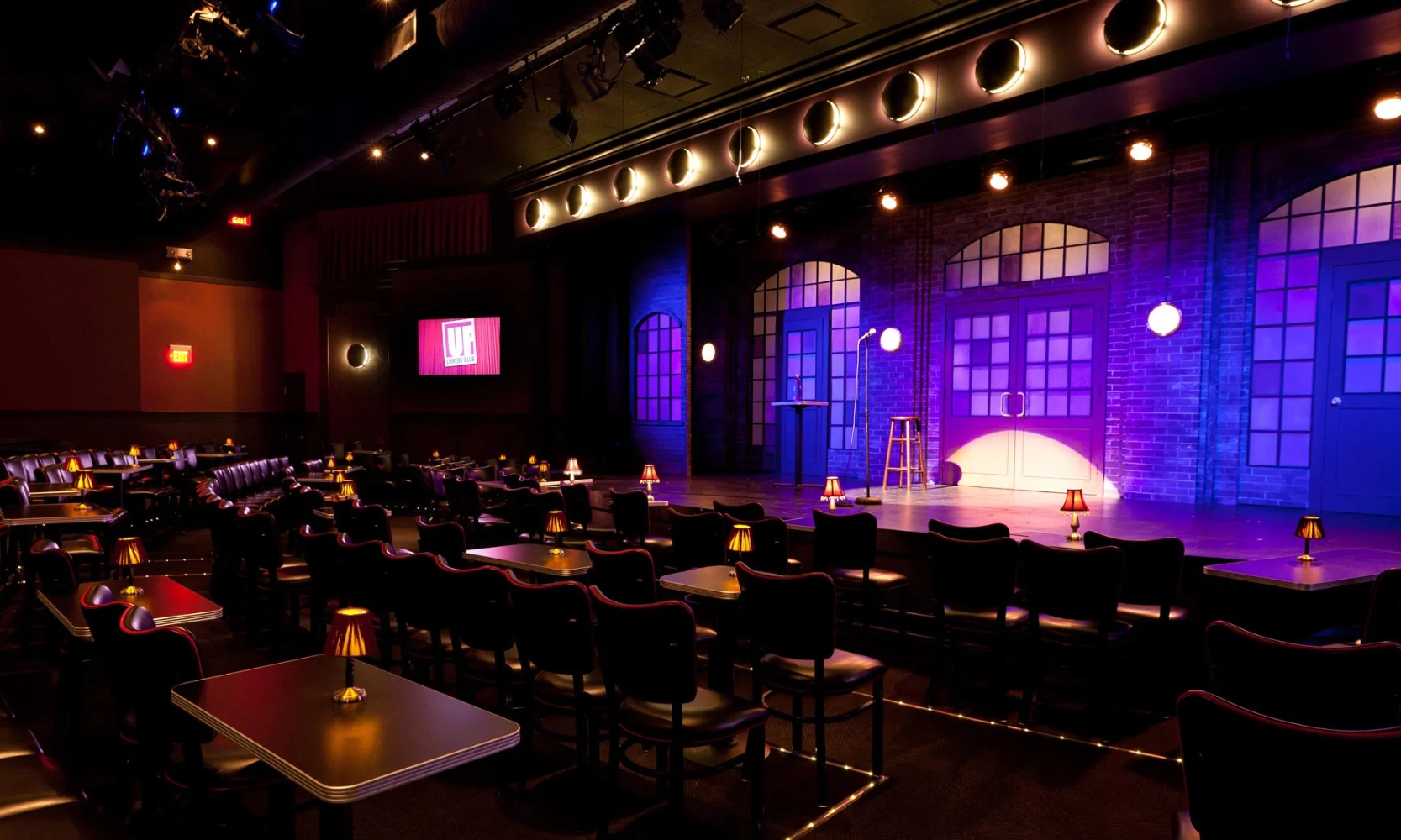 Interior image of The Second City comedy club in Chicago showing the seats and stage